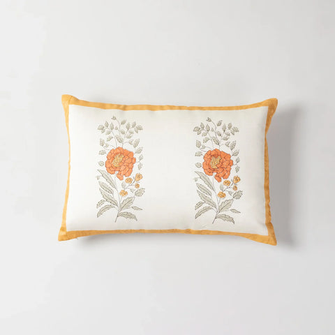Full-size Chanderi lumbar cushion cover featuring orange marigold buta motifs and embroidered detailing