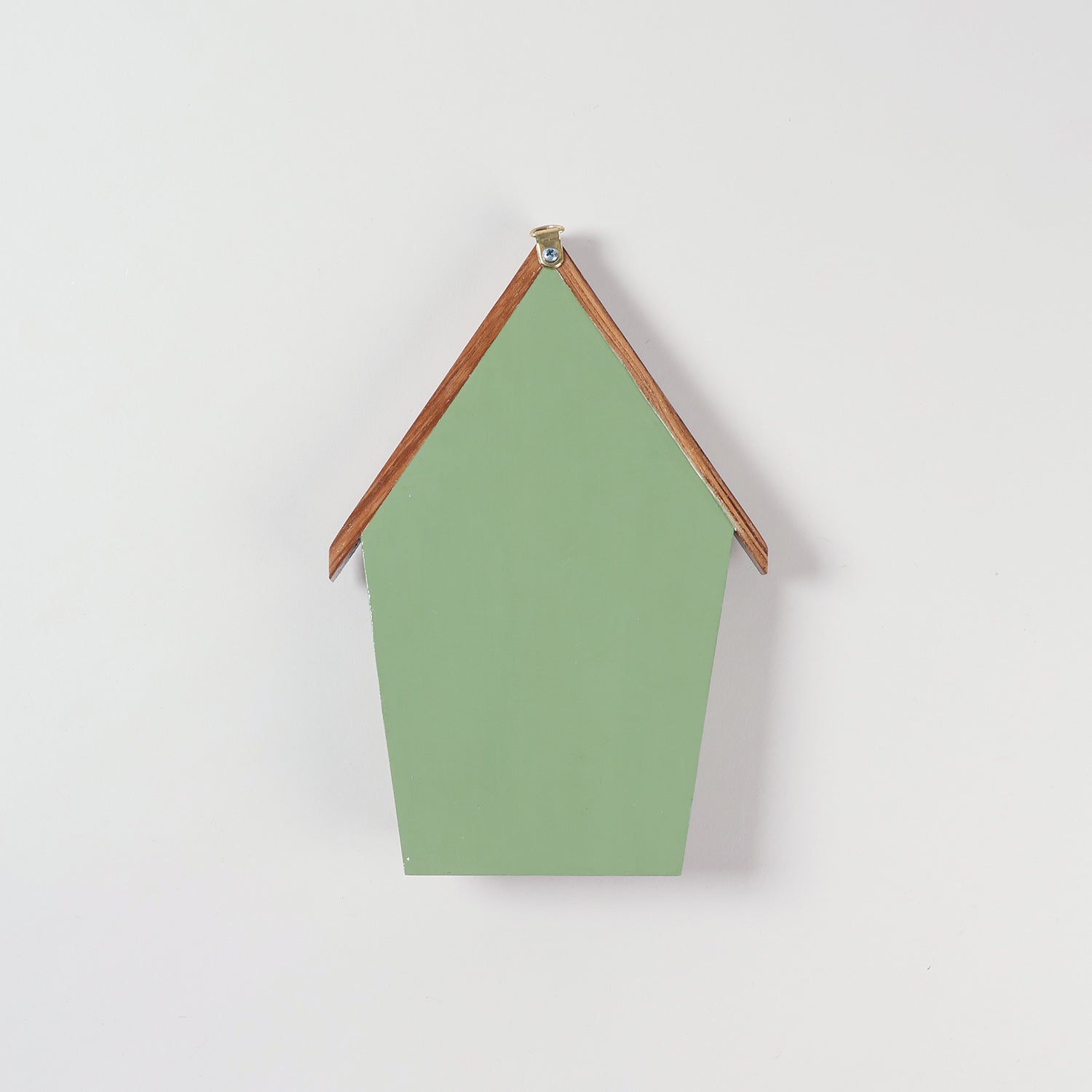 Reverse side of handmade bamboo key holder showing the back panel, hanging fixture, and wall mounting design
