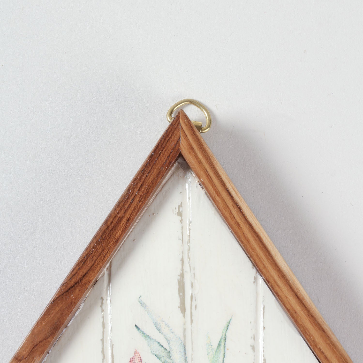 Close-up of the hanging loop on a handmade bamboo key holder showing sturdy wall mounting hardware and handcrafted construction