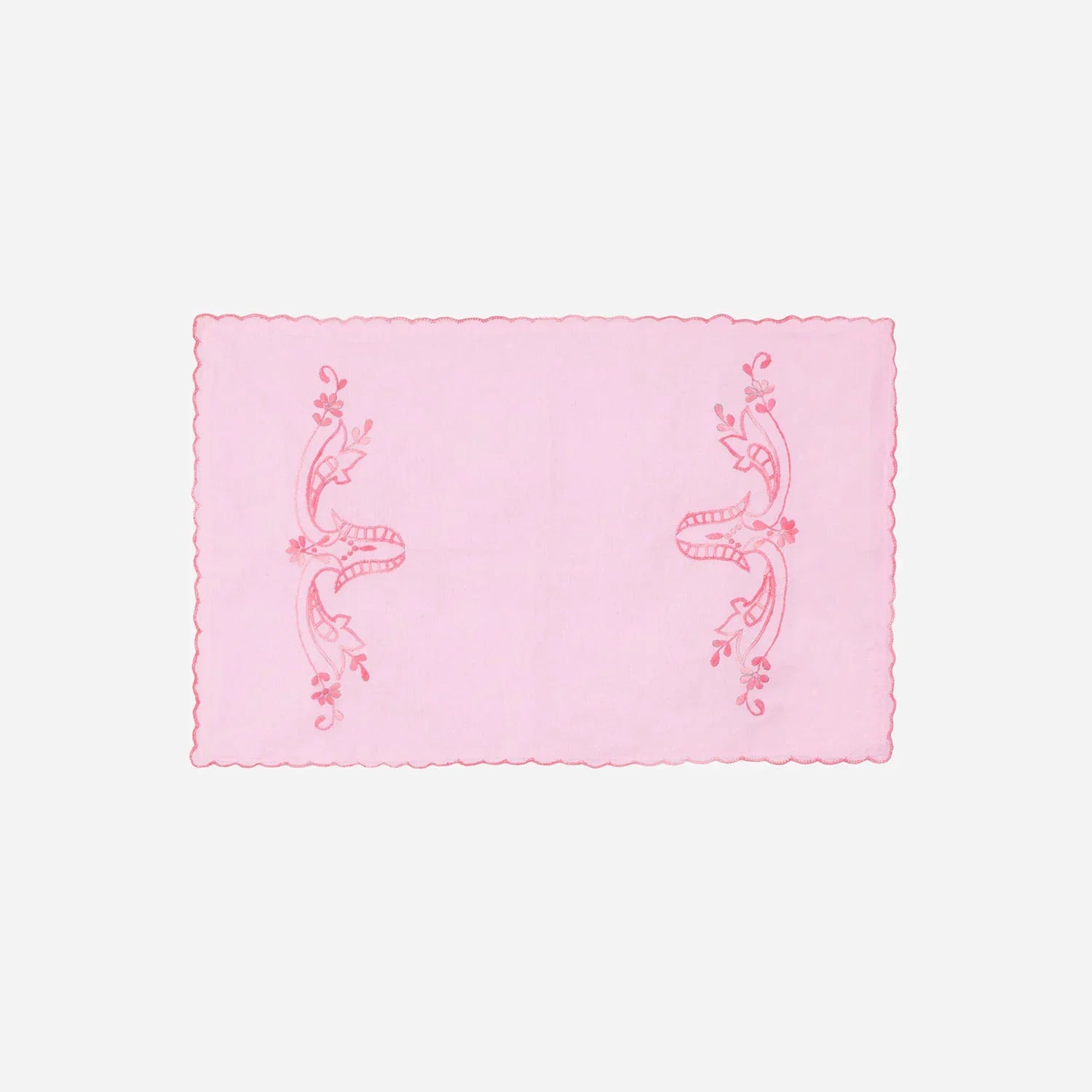 Pink cotton pillow cases featuring matching dark pink chikankari hand embroidery