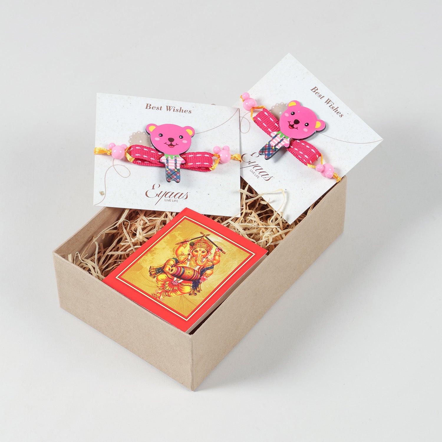 Pink Teddy Bear Wooden Kids Rakhi Set of 2 neatly arranged inside a festive gift box for a thoughtful Raksha Bandhan surprise
