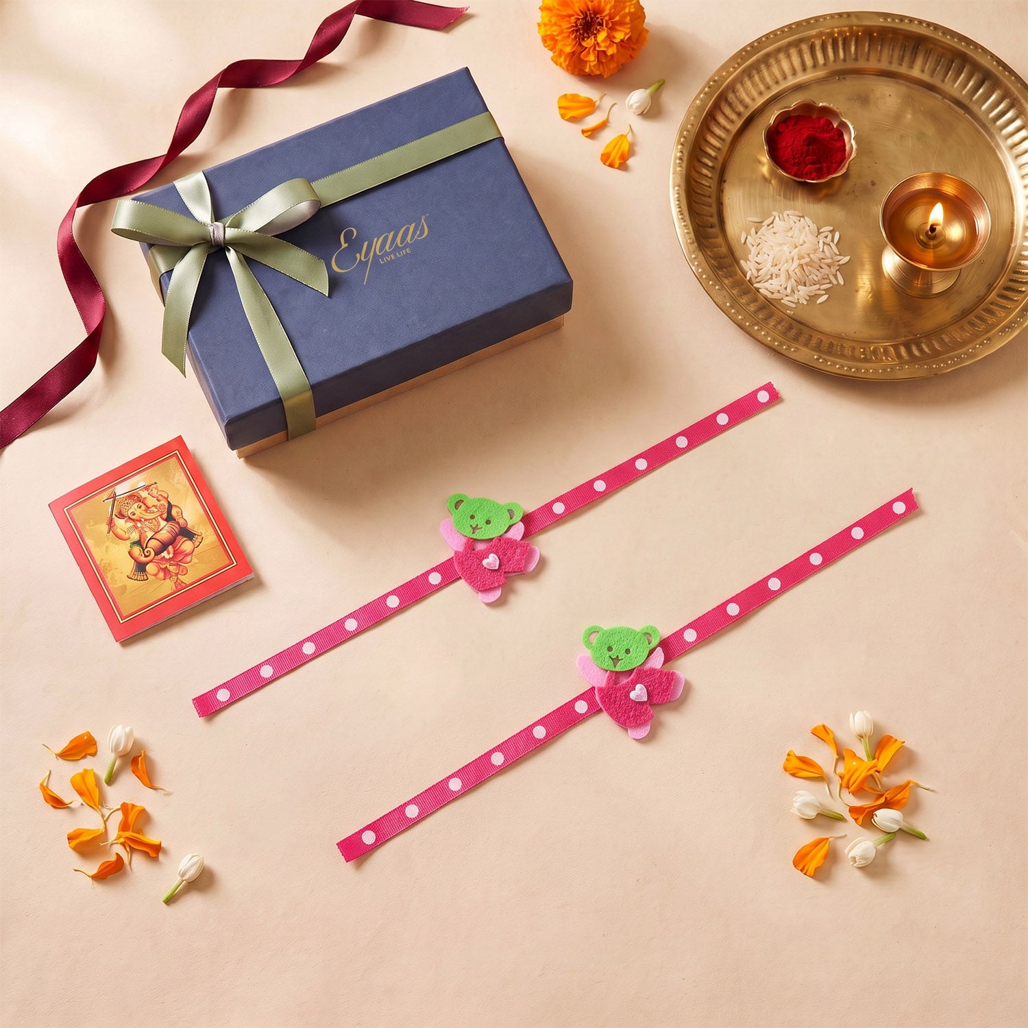 Handmade Pink Teddy Bear Felt Kids Rakhi, beautifully presented in a festive gift box with satin ribbon, ready for Raksha Bandhan gifting.