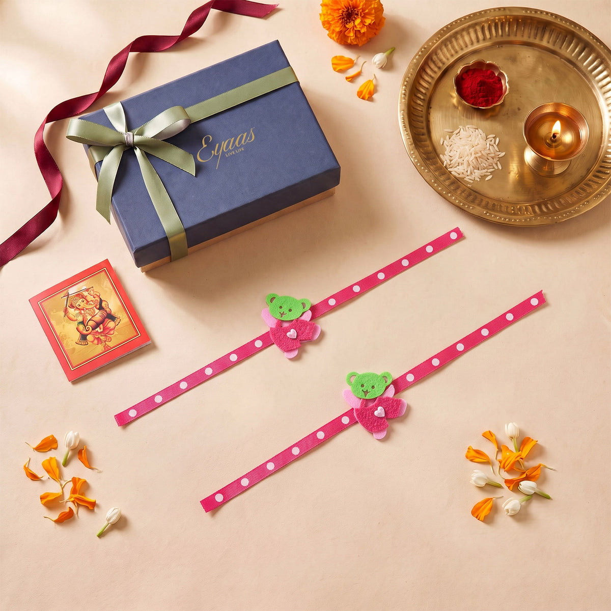 Handmade Pink Teddy Bear Felt Kids Rakhi, beautifully presented in a festive gift box with satin ribbon, ready for Raksha Bandhan gifting.