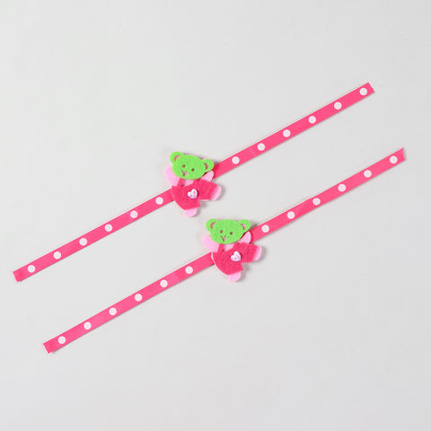 Full-length view of the pink Teddy Bear Felt Rakhi Kids Set of 2 showing the complete ribbon band and handcrafted teddy bear design.