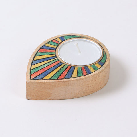 Handcarved rainbow raindrop wooden t-light holder showcasing its curved shape and colourful detailing