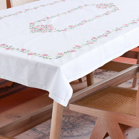 Rangoon creeper embroidered cutwork table cloth styled on a dining table for elegant dining table decor and entertaining