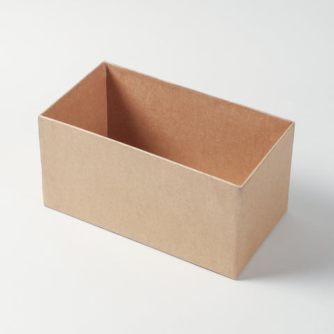 Open rectangular gift box with the bamboo lid lifted to show the interior