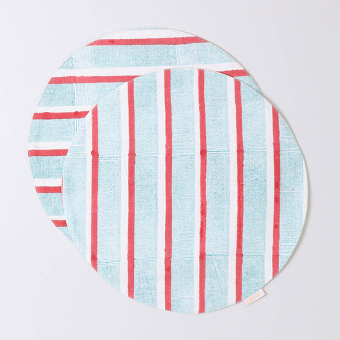 Set of 2 round cotton placemats featuring red and green stripe block printed designs displayed on a plain background