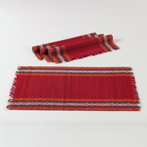 Red natural fibre placemats crafted from Madhurkathi grass, displayed as a dining table mat set of 4 with a handwoven texture