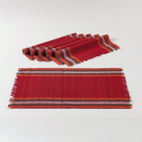Handmade red table runner and placemats set crafted from Madurkathi grass, showcasing natural fibre texture and colourful woven borders