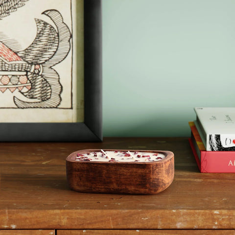 Soy wax rose scented candle in a handcrafted wooden tub displayed as a decorative home accent