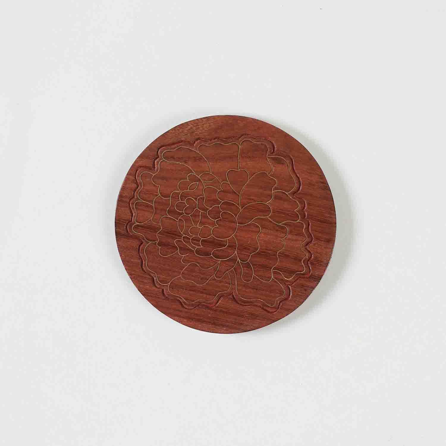 Single rosewood coaster featuring marigold floral brass inlay, handcrafted using traditional Tarkashi techniques