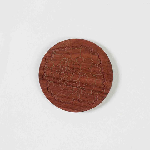 Single rosewood coaster featuring marigold floral brass inlay, handcrafted using traditional Tarkashi techniques