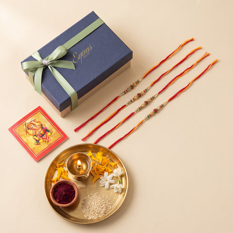Handmade Rudraksha & Metal Bead Rakhi for Brothers Set of 4, beautifully presented in a festive gift box for Raksha Bandhan gifting