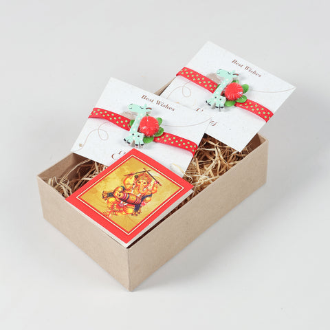 Set of 2 Giraffe Wooden Kids Rakhi arranged inside a Raksha Bandhan gift box