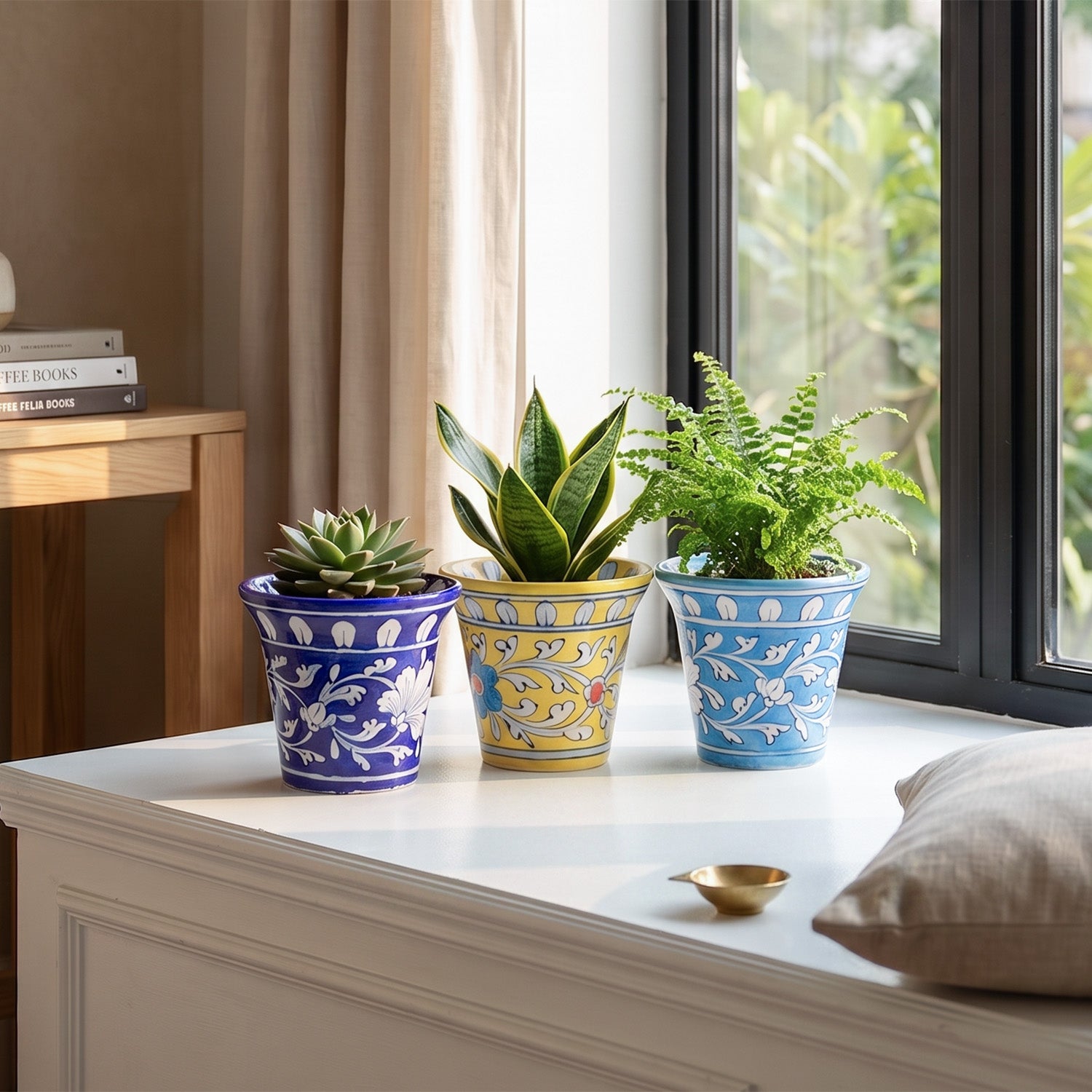 Set of 3 Blue Pottery planters styled with plants for a colourful home garden