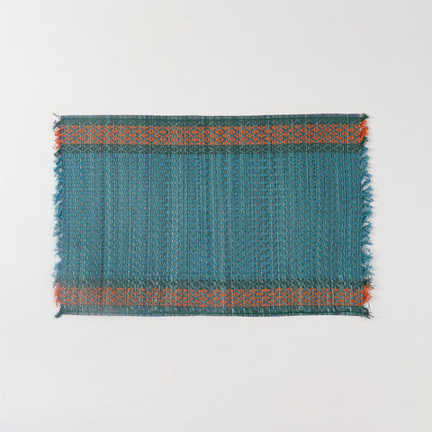 Single handmade blue Madurkathi placemat crafted from natural river grass, ideal for dining table décor and everyday use