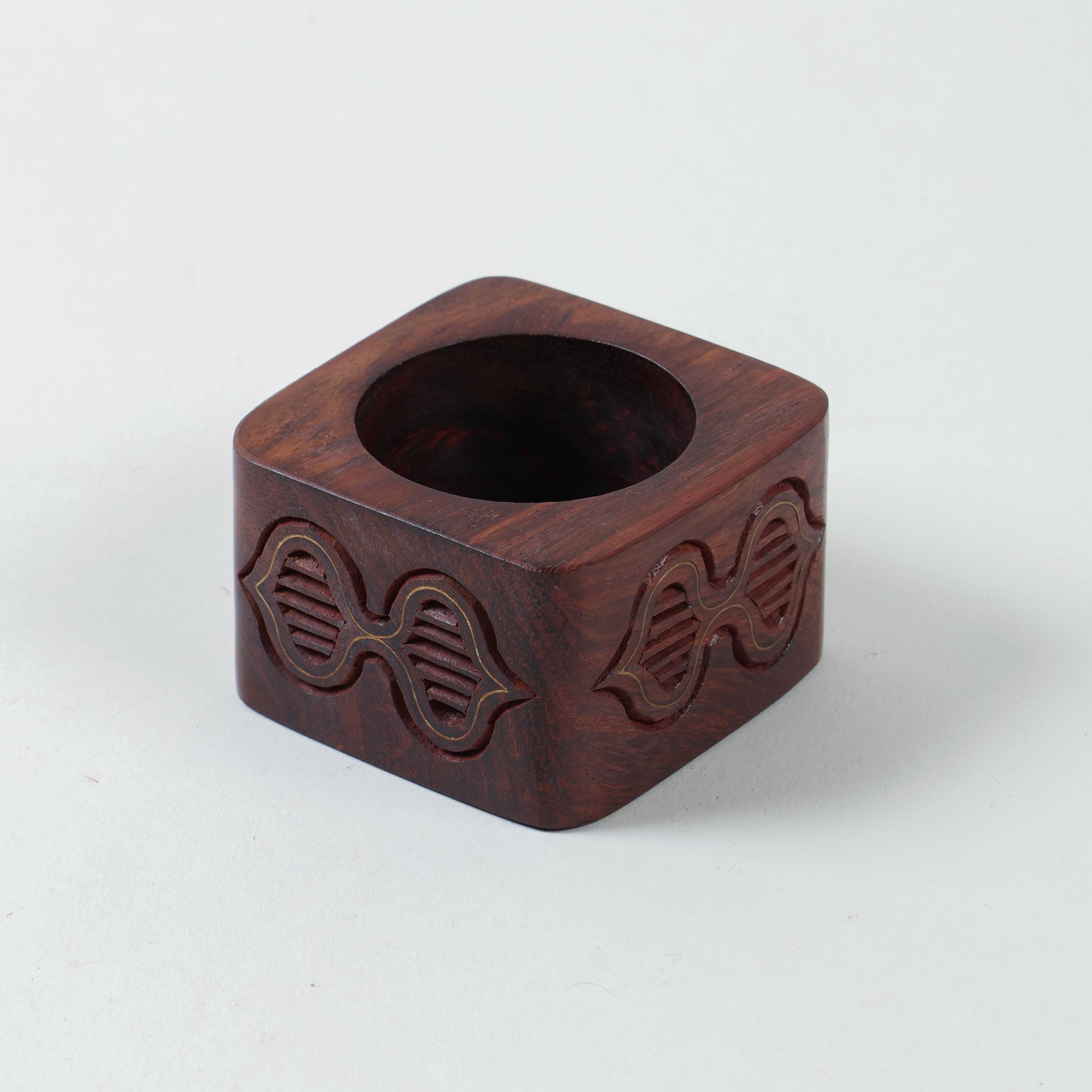 Wooden napkin ring engraved with butterfly motifs and decorated with traditional brass inlay work