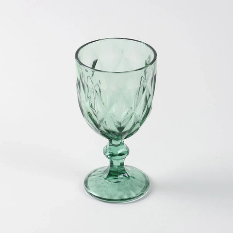 Front view of a single green diamond wine glasses highlighting shape finish and handcrafted detailing