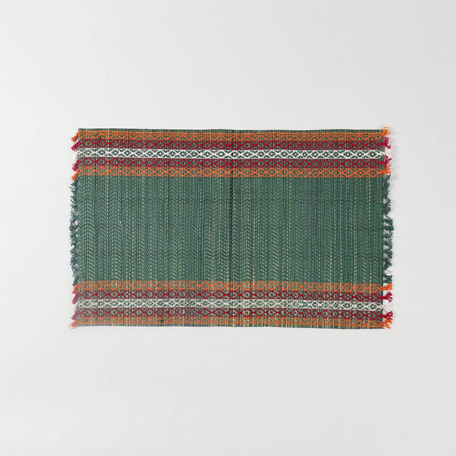 Single handmade green Madurkathi placemat crafted from natural river grass, ideal for dining table décor and everyday use