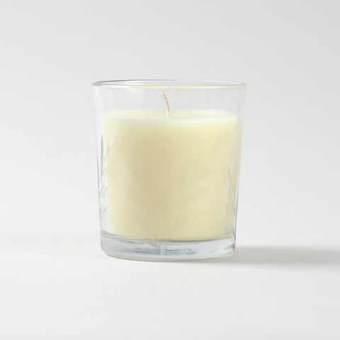 Jasmine scented soy candle in a decorative white glass jar for home fragrance and ambience