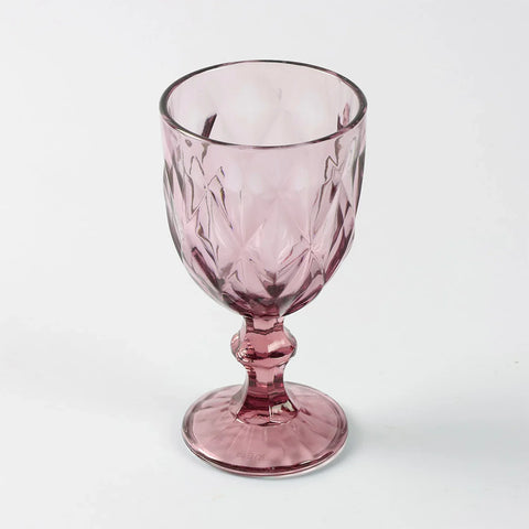 Front view of a single pink diamond wine glass, highlighting shape finish and handcrafted detailing