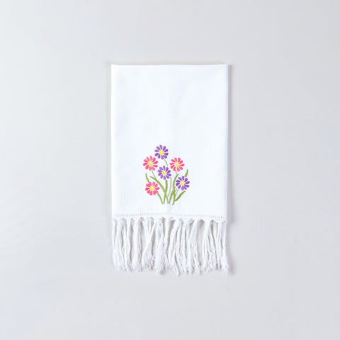 White cotton kitchen towel decorated with pink and purple daisy embroidery inspired by Bengal chikankari art