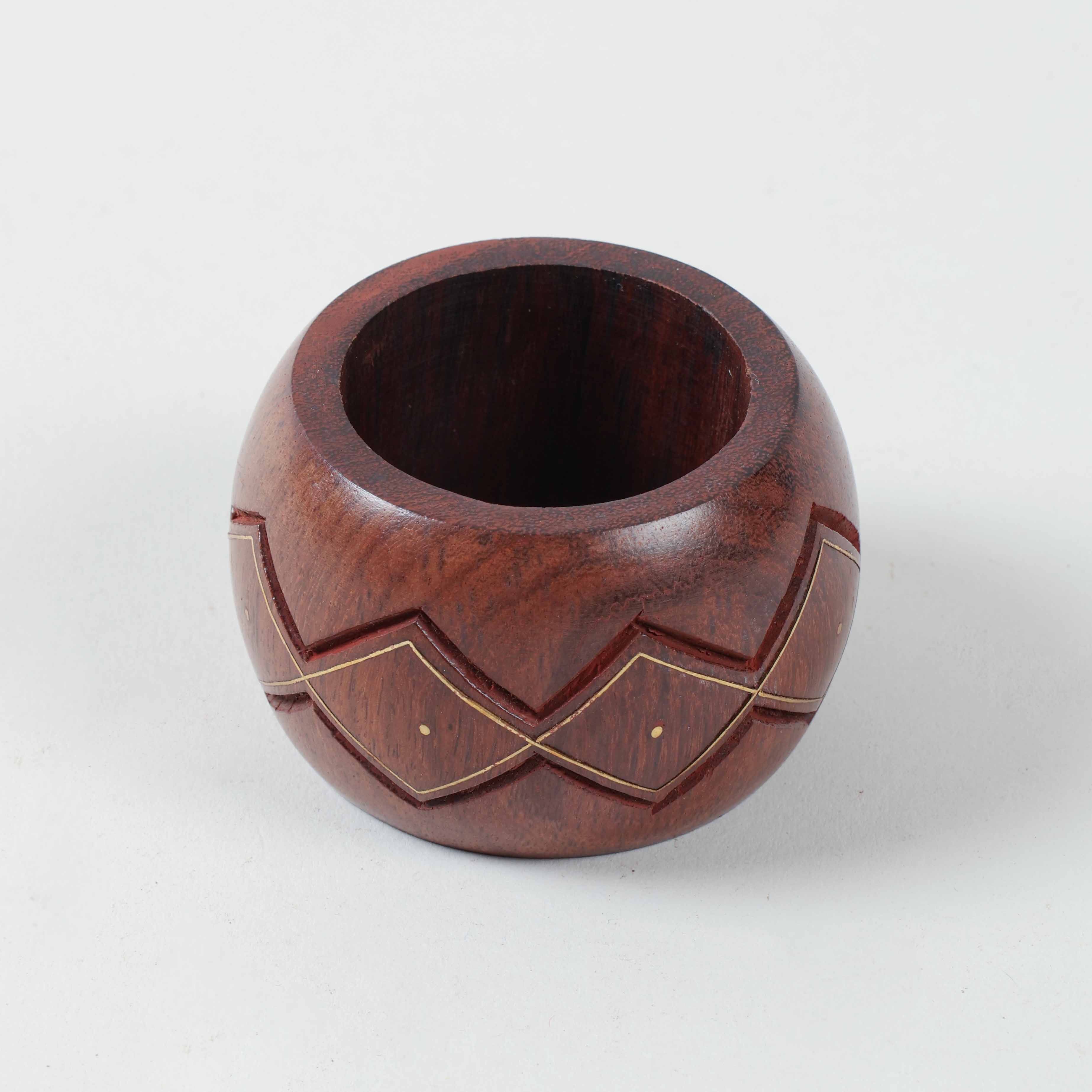 Round wooden napkin ring with handcrafted zig-zag carving and fine brass wire inlay detailing