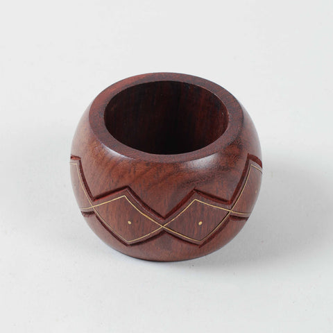 Round wooden napkin ring with handcrafted zig-zag carving and fine brass wire inlay detailing