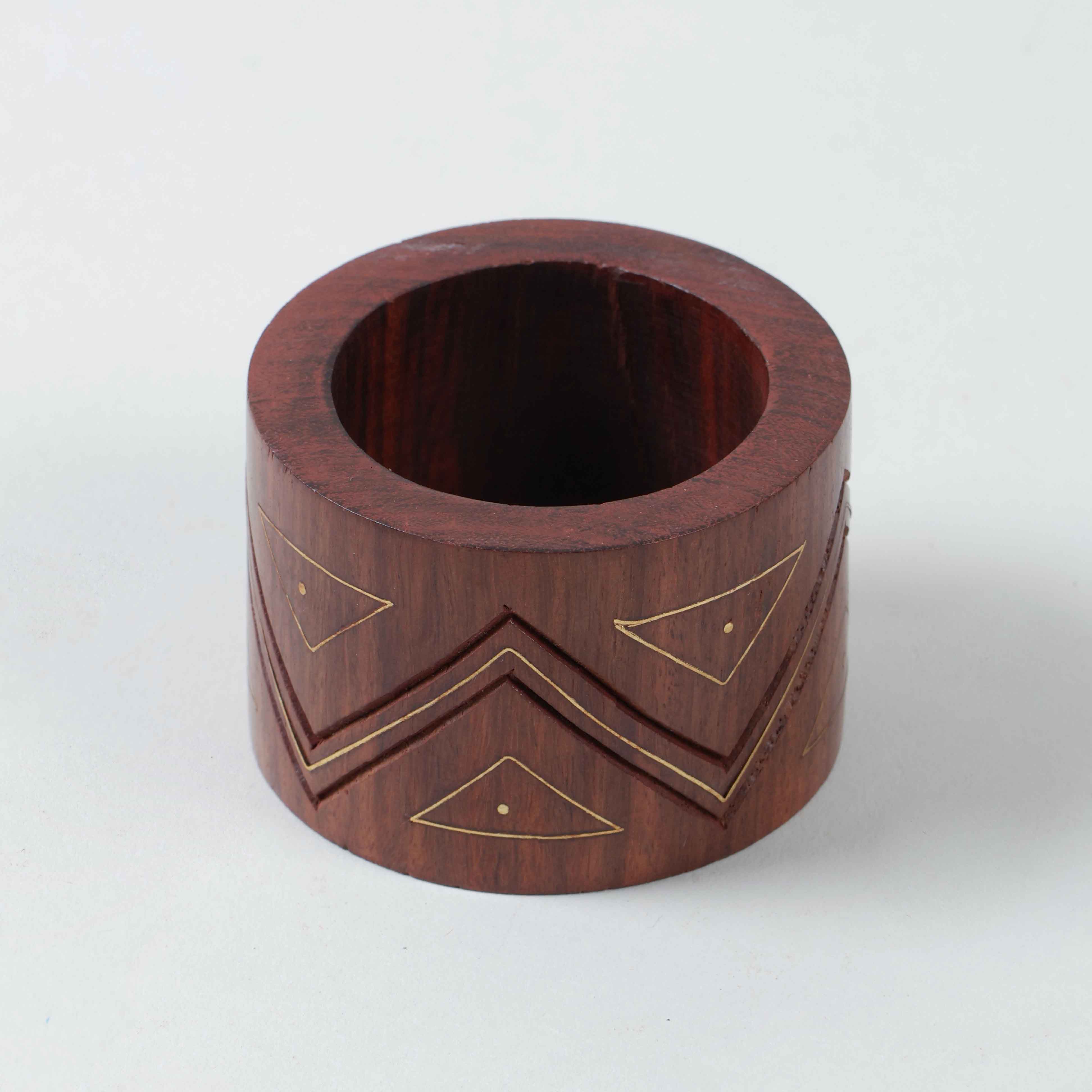 Wooden napkin ring with handcrafted zig-zag carving and traditional brass inlay work