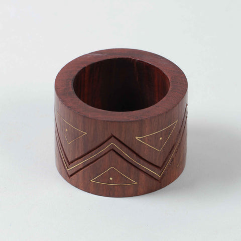 Wooden napkin ring with handcrafted zig-zag carving and traditional brass inlay work