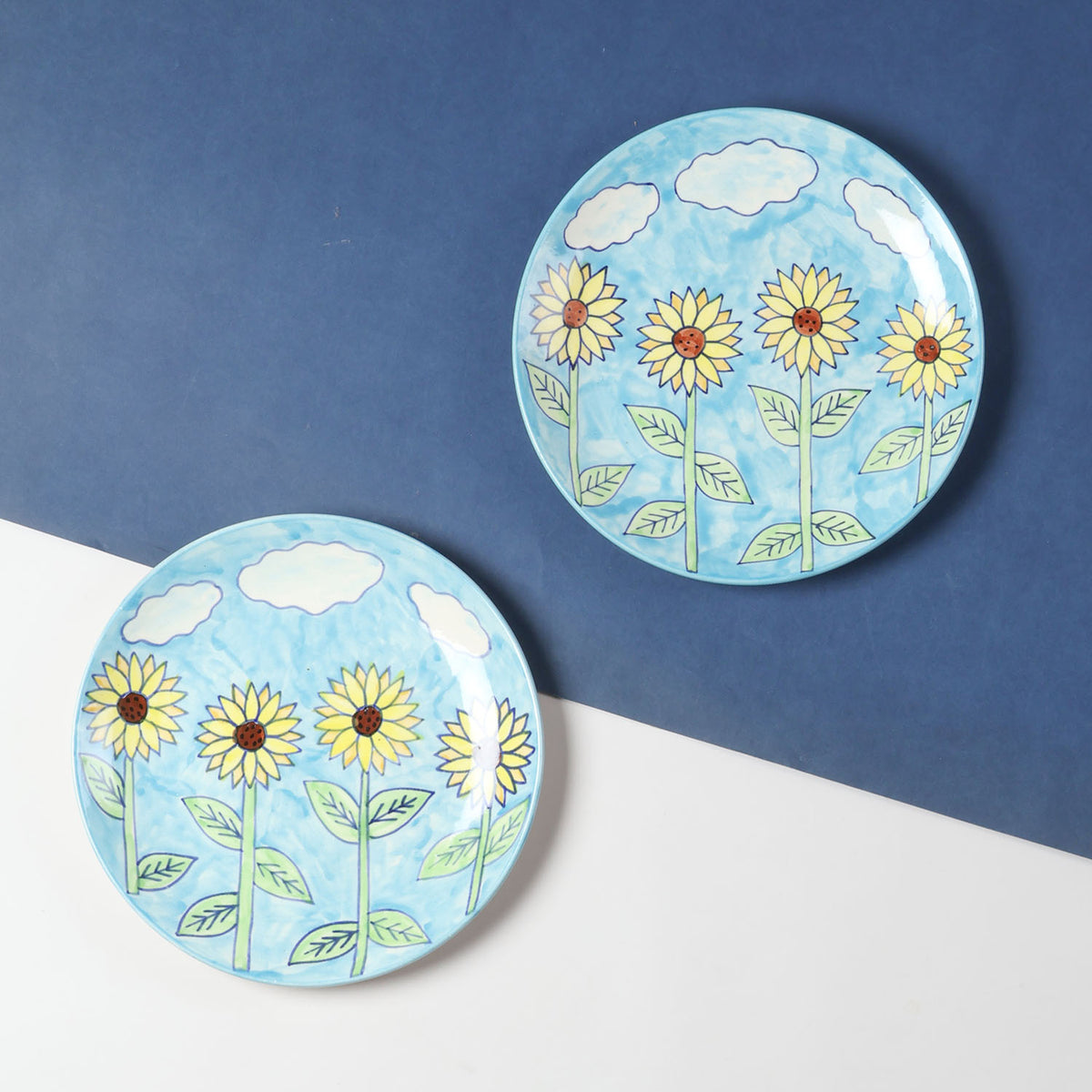 Sunflower ceramic dinner plate set of 2 with hand-painted floral artwork on a blue background, ideal for everyday dining and table settings