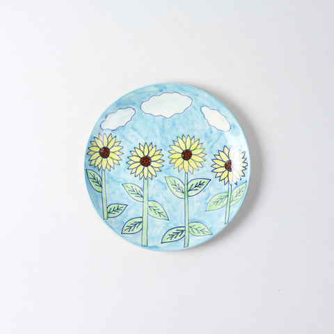 Hand-painted Sunflower ceramic dinner plate featuring a light blue background and vibrant sunflower motifs, ideal for everyday dining and serving