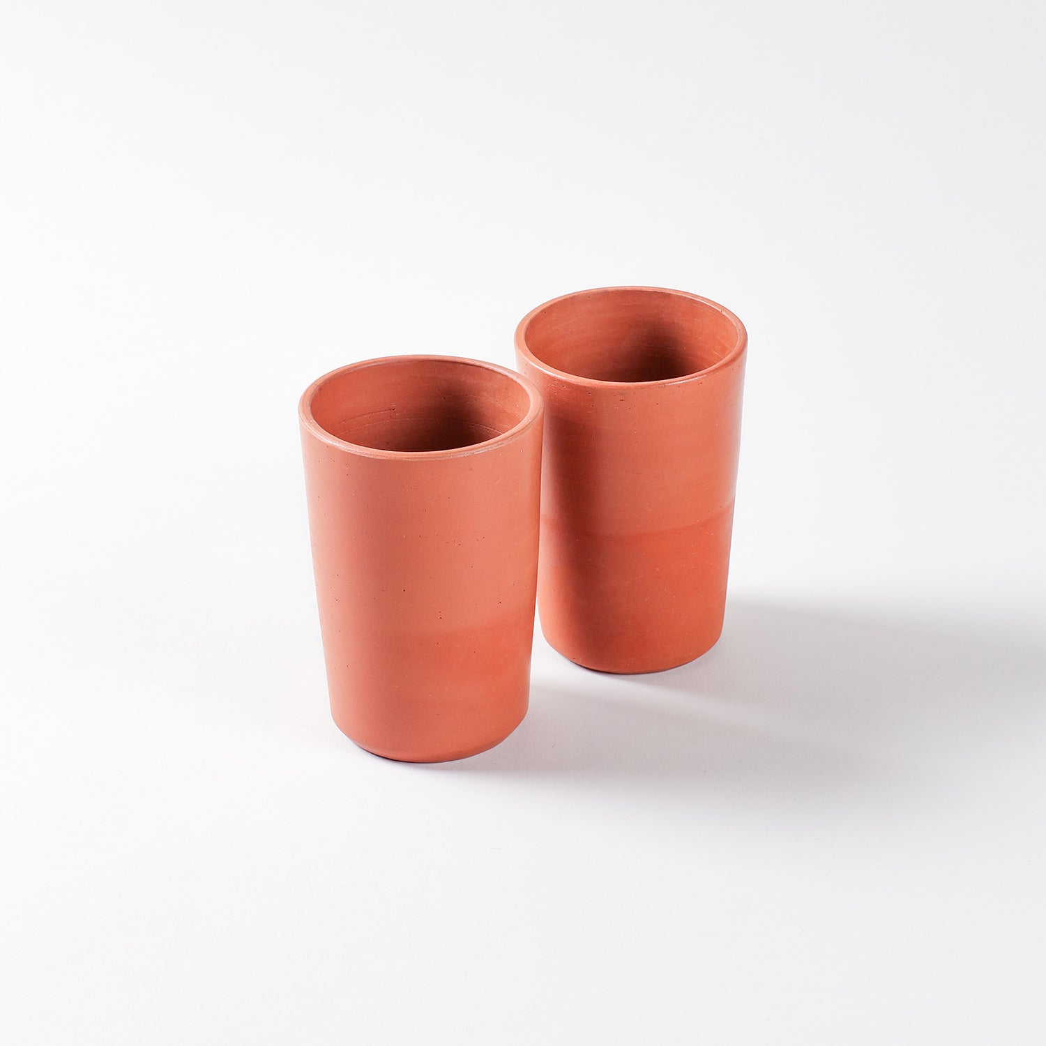 Set of two handmade terracotta tumblers for water buttermilk and traditional beverages