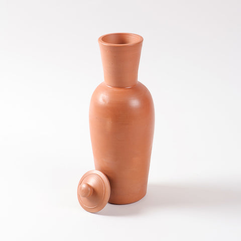 Terracotta water bottle with matching clay lid displayed open on a plain background, showcasing its handcrafted earthen design