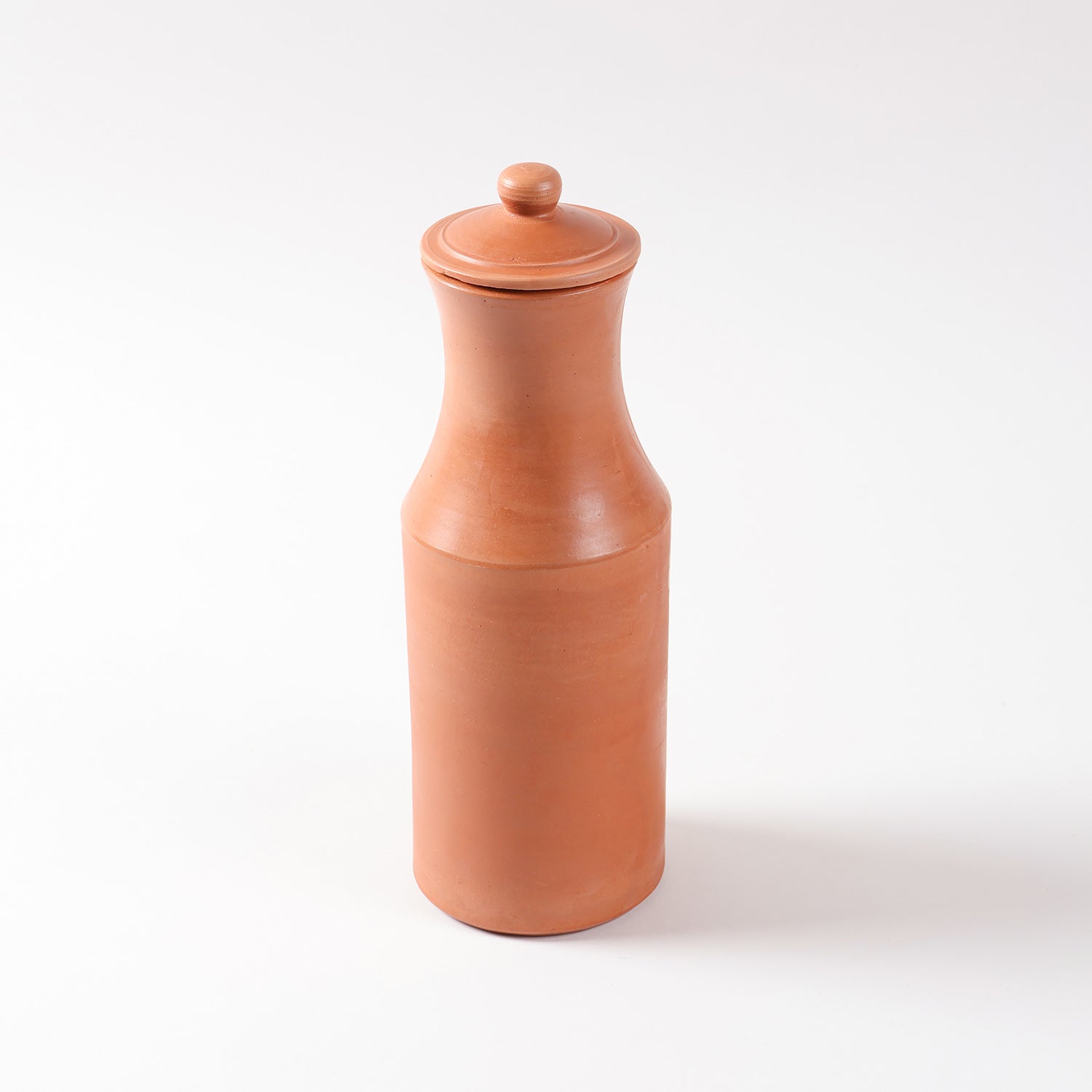 Side profile of terracotta water pitcher highlighting its handcrafted clay body, natural finish, and traditional Indian craftsmanship