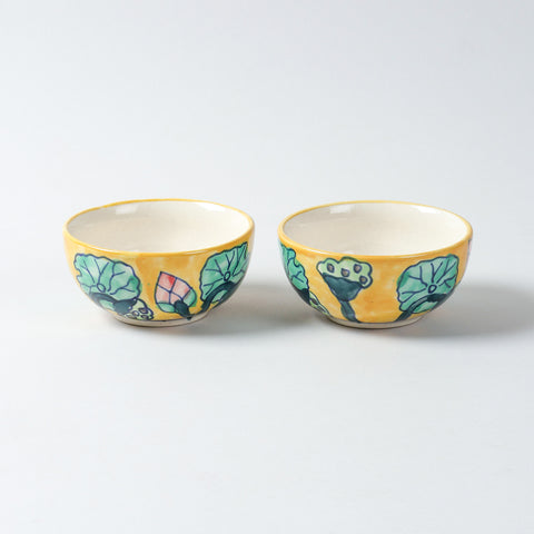 Hand-painted Water Lily ceramic katori set of 2 placed side by side on a plain background, featuring vibrant floral motifs inspired by water lilies and Khurja ceramics