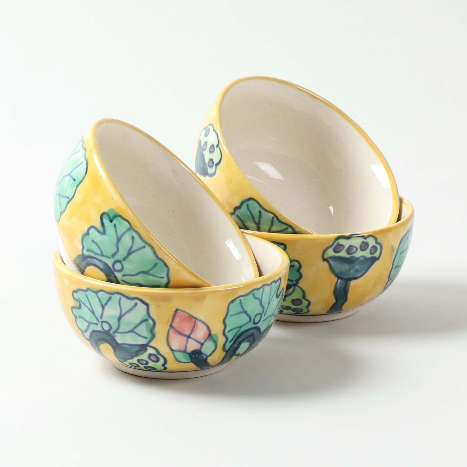 Hand-painted Water Lily ceramic katori set of 4 displayed on a plain background, featuring handcrafted Khurja ceramic artistry and floral designs