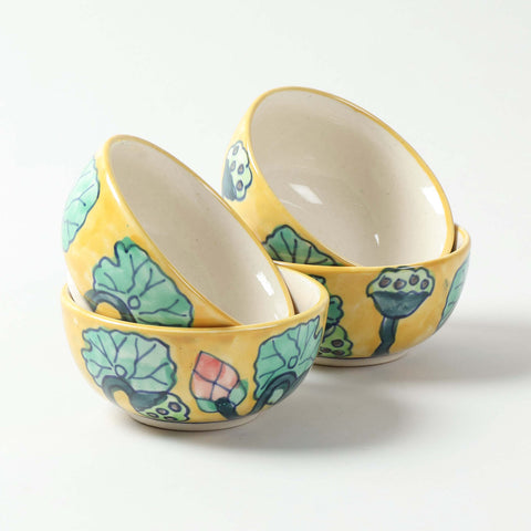 Hand-painted Water Lily ceramic katori set of 4 displayed on a plain background, featuring handcrafted Khurja ceramic artistry and floral designs