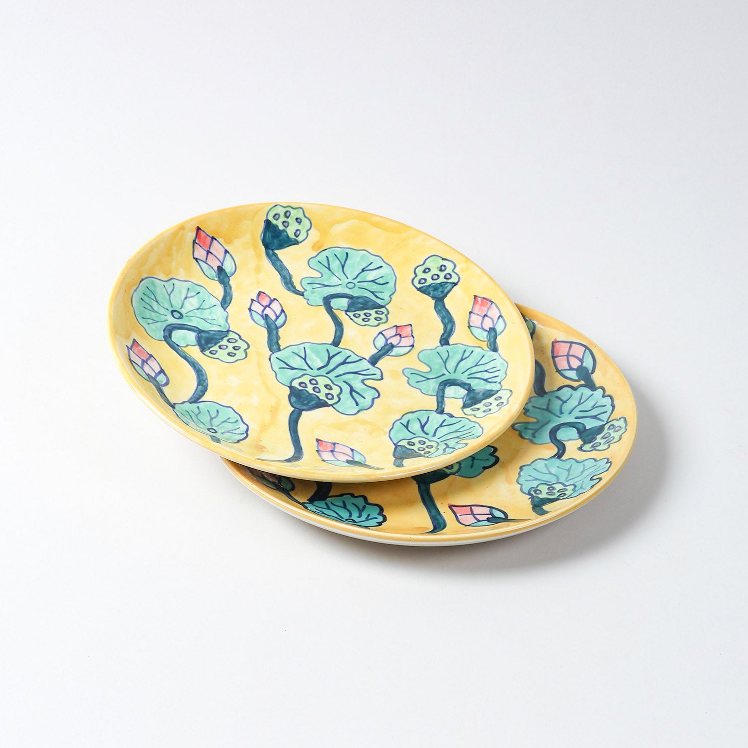 Set of 2 hand-painted Waterlily ceramic dinner plates with floral artwork, displayed on a plain background