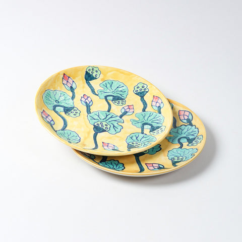 Set of 2 hand-painted Waterlily ceramic dinner plates with floral artwork, displayed on a plain background