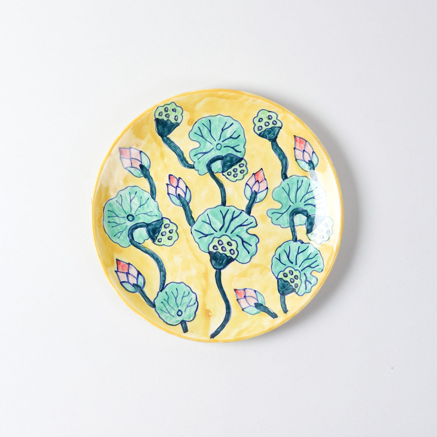 Hand-painted Waterlily ceramic dinner plate featuring yellow, green, and pink floral motifs, ideal for everyday dining and serving