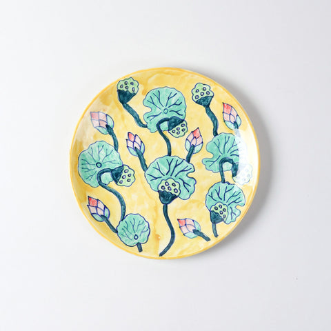 Hand-painted Waterlily ceramic dinner plate featuring yellow, green, and pink floral motifs, ideal for everyday dining and serving