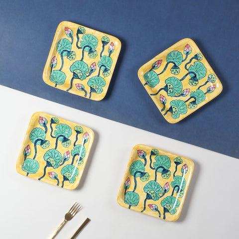 Hand-painted Waterlily ceramic square platter set of 4 featuring yellow, green, and pink floral motifs, styled as elegant snack platters for table settings