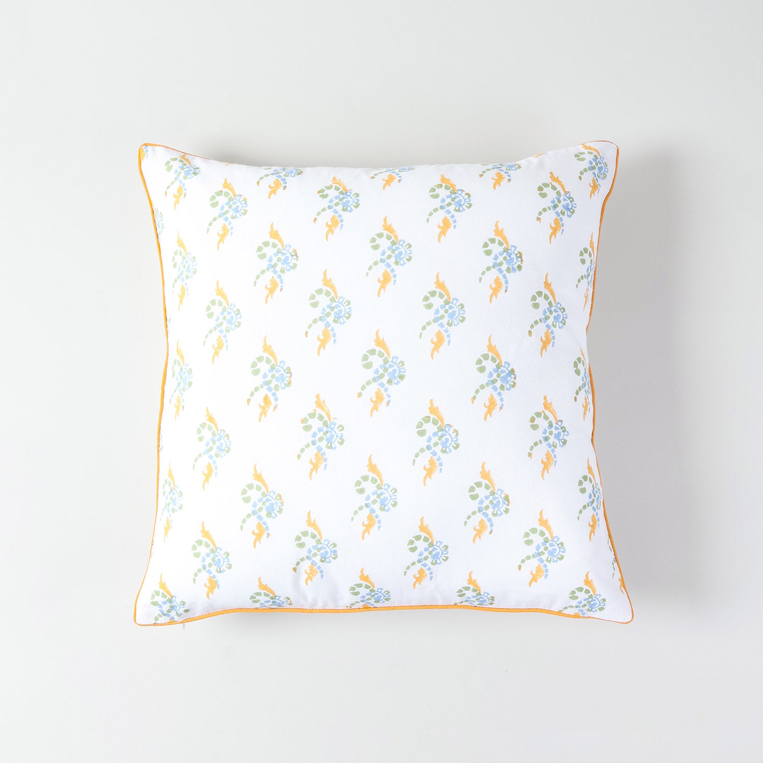 Premium white cotton sheeting cushion cover with orange, green, and blue handcrafted motifs and perfect finishing
