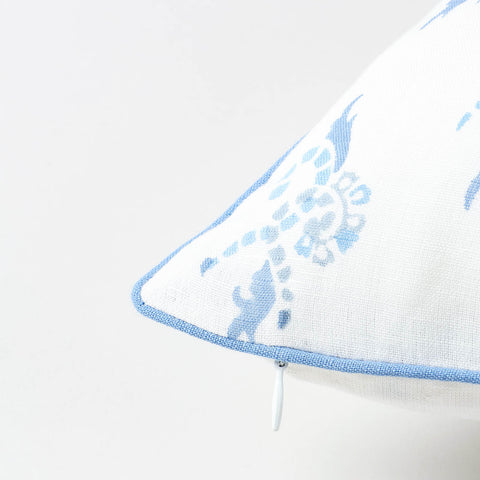 Hand block printed blue swirl motif on white cotton linen fabric highlighting handcrafted detailing