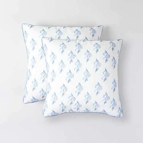Set of two white and blue artisan cushion covers for coordinated sofa and chair styling