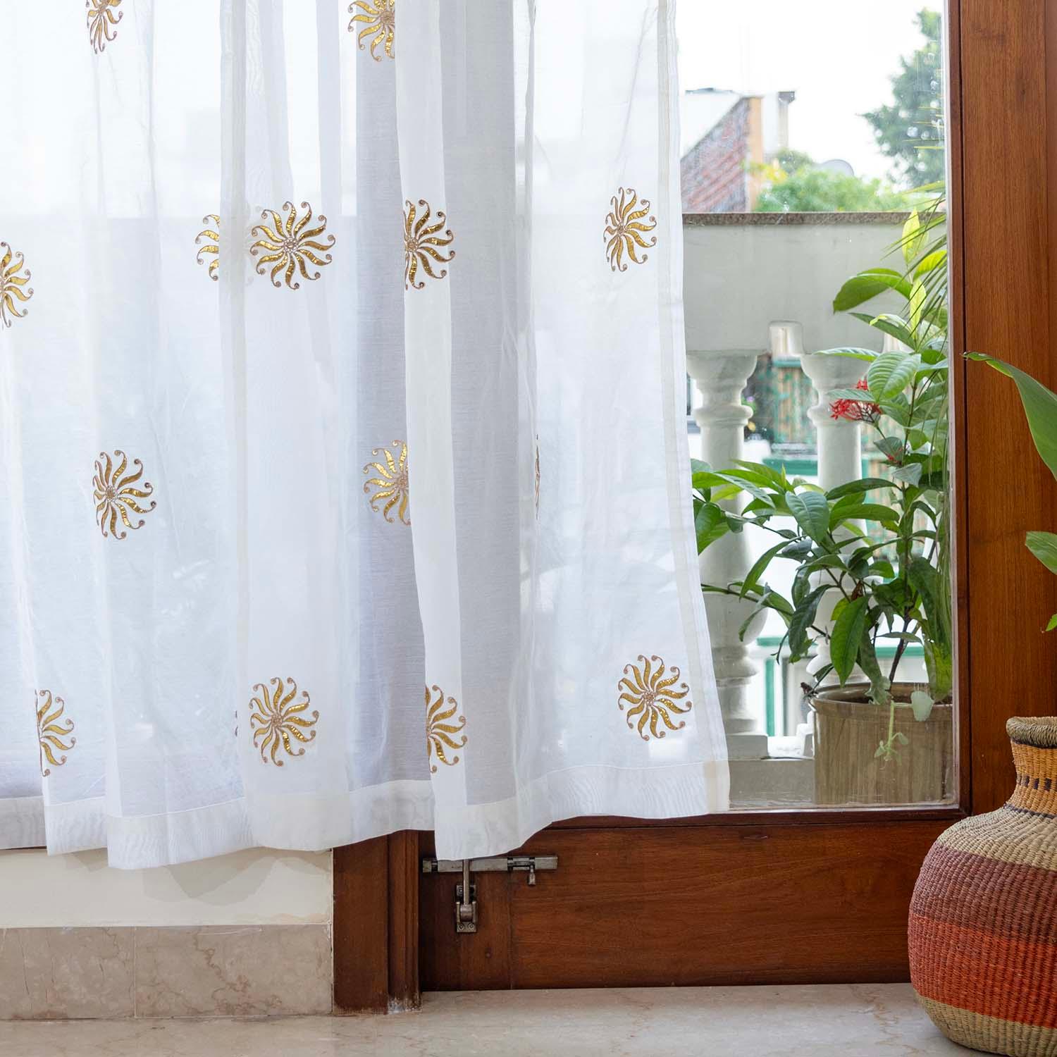 White Chanderi gota curtain styled for festive home décor and elegant celebrations