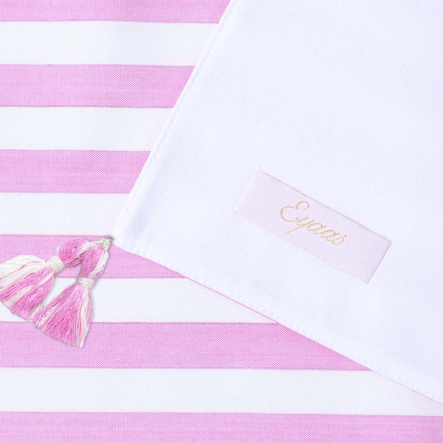 Front and back view of handwoven cotton table runner highlighting striped design, tasselled edges, and handcrafted table linen quality