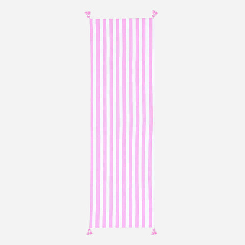 Full-length handwoven cotton table runner featuring white and pink stripes with tasselled ends displayed on a plain background